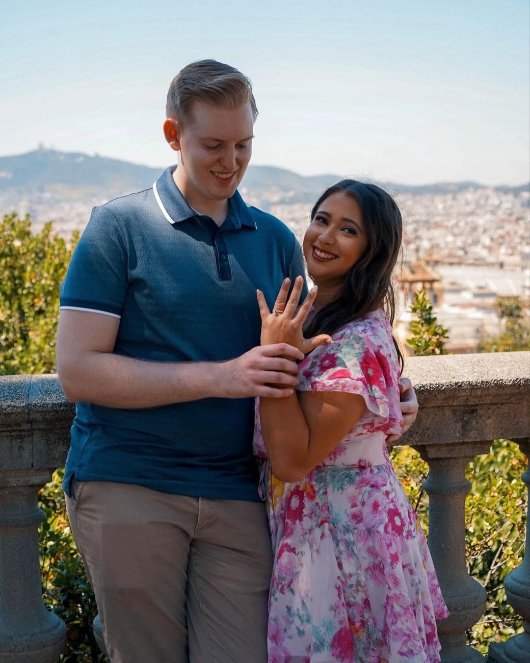 Allison showing off her new engagement ring in Barcelona