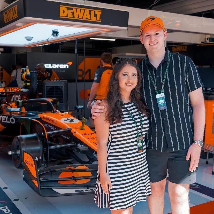 Allison and Daniel in the McLaren garage on a race weekend